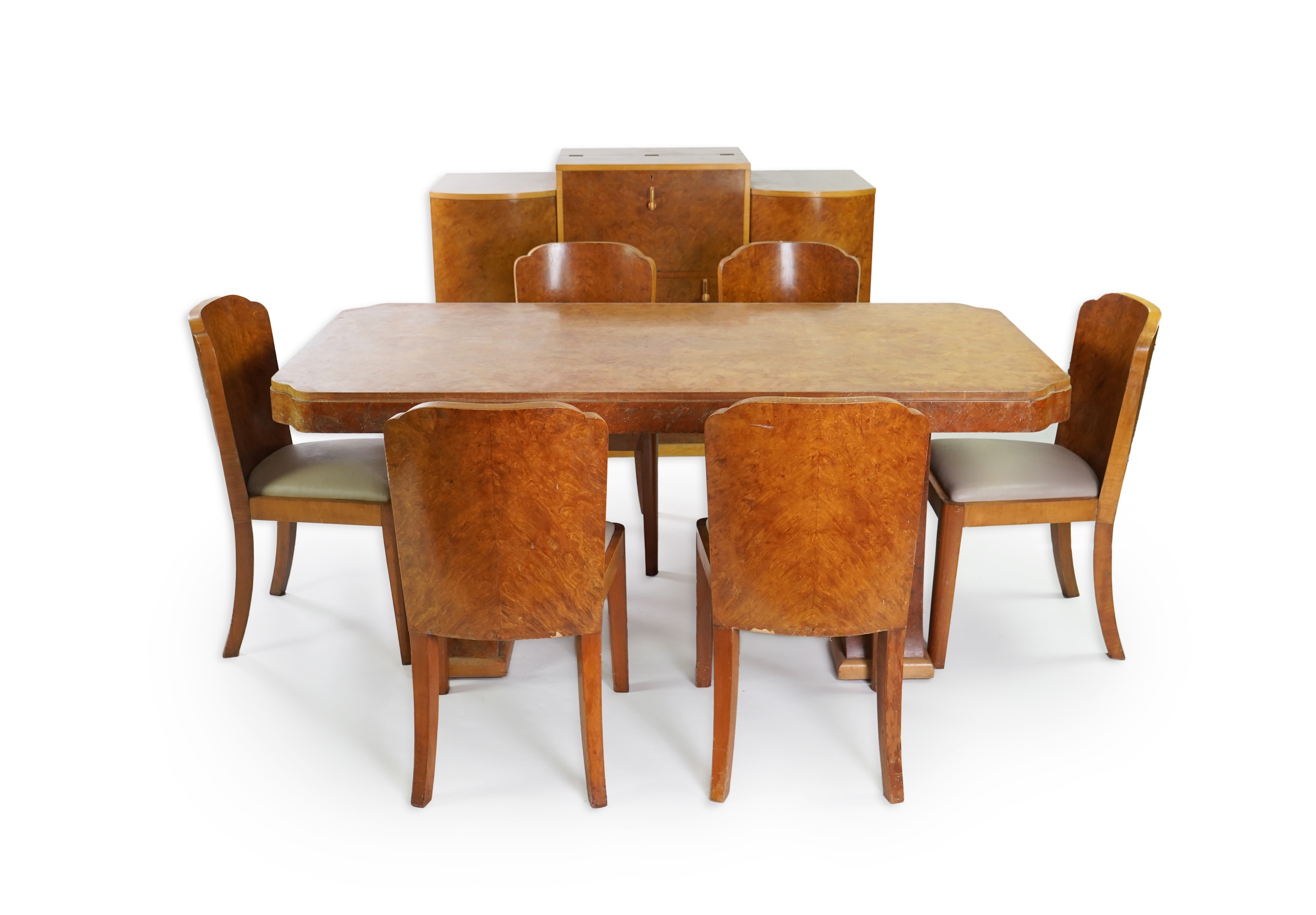Attributed to Harry and Lou Epstein: An Art Deco burr walnut dining suite